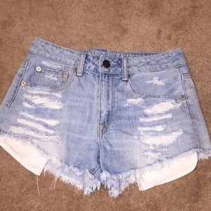 High rise light wash jean shorts.